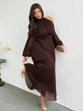 Angled front view of dark brown plus size halter maxi dress