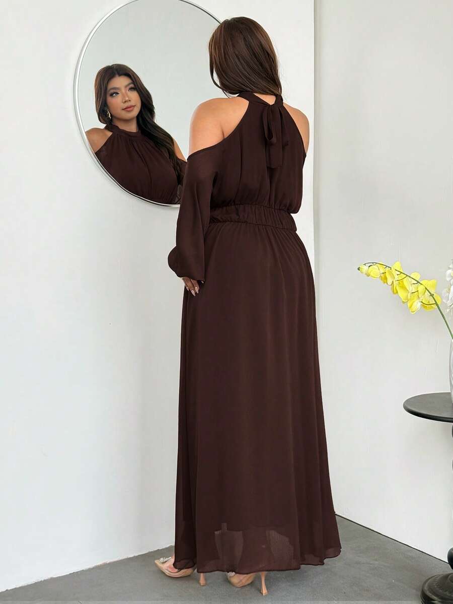 Back view of dark brown halter tie-back maxi dress
