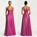 Front and back views of a vivid fuchsia long satin dress