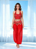Red embellished halter crop top with gold coin belt and loose harem trousers