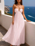 Baby pink pleated open-back maxi dress with tie closure, rear view