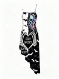 Front view of black white purple and teal skull bat print spaghetti strap dress