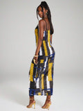 Back view of fitted color block maxi slip dress with thin straps and straight hem
