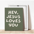 Front and back view of unframed sage green Jesus Loves You canvas print
