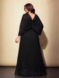Shop a plus size black chiffon pleated dress with rhinestone accents. Perfect for parties, weddings, cocktail events, dinners, holidays, and special occasions.
