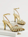 Gold open-toe stiletto sandal with sparkling rhinestone straps