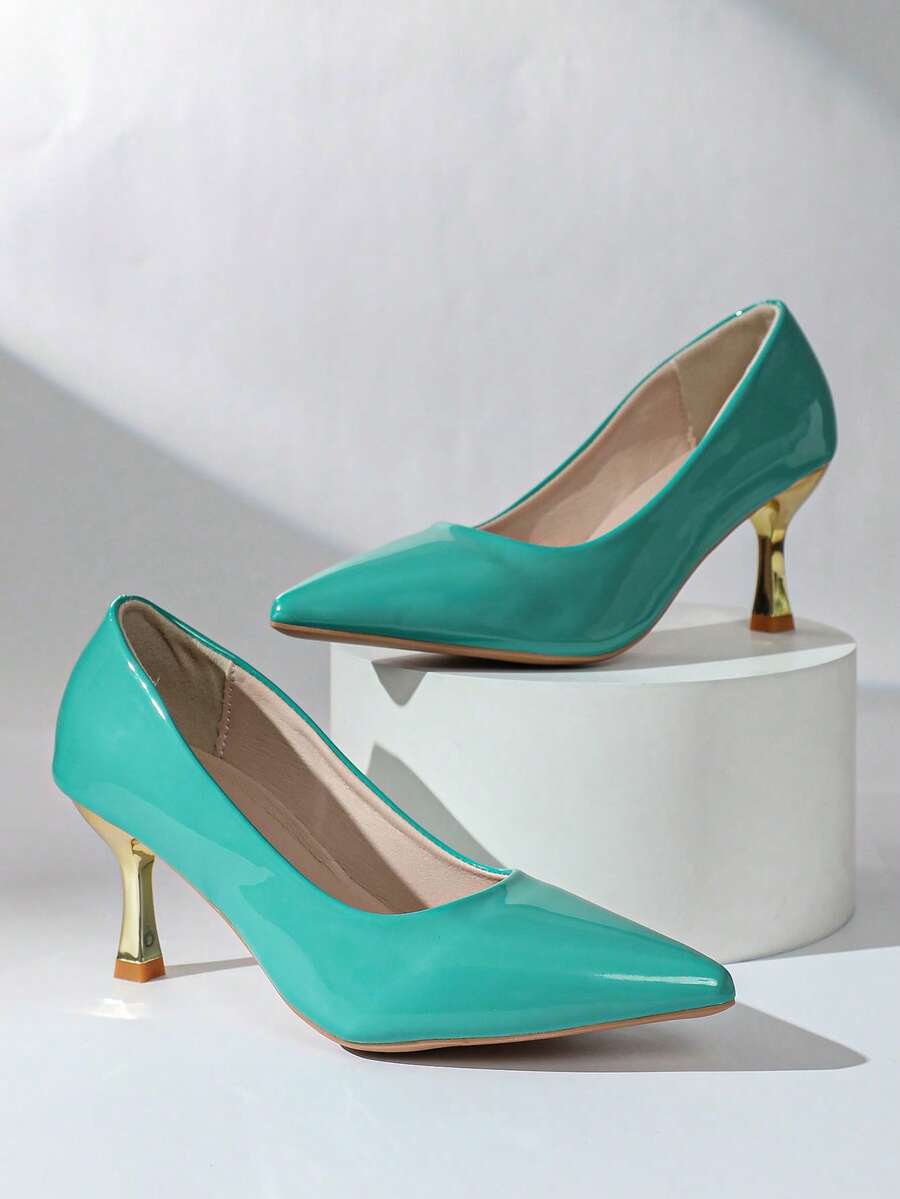 Turquoise pointed toe pump with glossy upper and gold heel