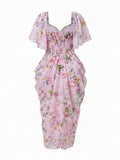 Pink floral midi dress with smocked sweetheart bodice and gathered skirt