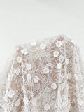 Back view of ivory lace-up corset and satin mermaid maxi skirt