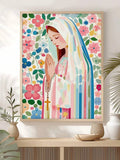 Light wood framed Virgin Mary prayer canvas art with colorful flowers over a console