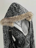 Close detail of grey leopard faux-fur trimmed zip-up hoodie