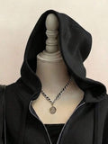 Close front view of black spiderweb hoodie with drawstring hood and zipper