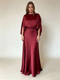 Burgundy floor-length gown with boat neckline and draped sleeves, studio front view
