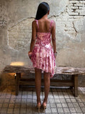 Floral paisley ruffle strap mini dress styled for a beach vacation