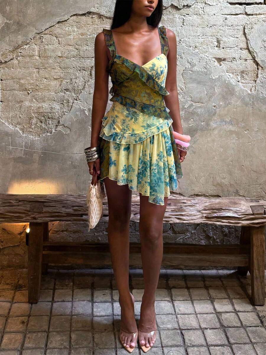 Green floral paisley dress showing high-waist bodice and flounced mini skirt