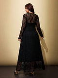 Black long-sleeve A-line maxi dress with floral lace shoulders and flared skirt