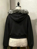 Back view of black hooded zip-up jacket with faux-fur trimmed hood