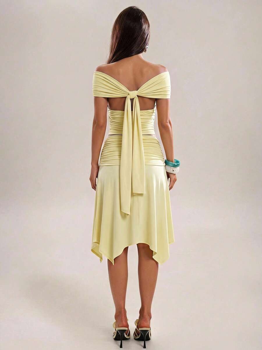 Brown two-piece skirt set featuring a sweetheart neckline and asymmetric hem