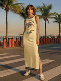 Side front view of butter yellow tropical toucan maxi dress by waterfront