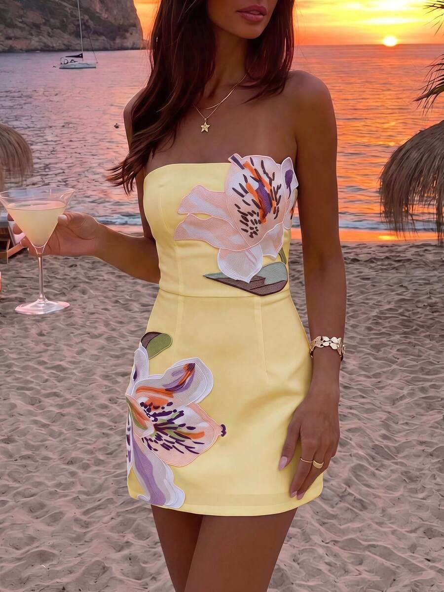 Light yellow fitted mini dress with dimensional flower appliqué at the bodice