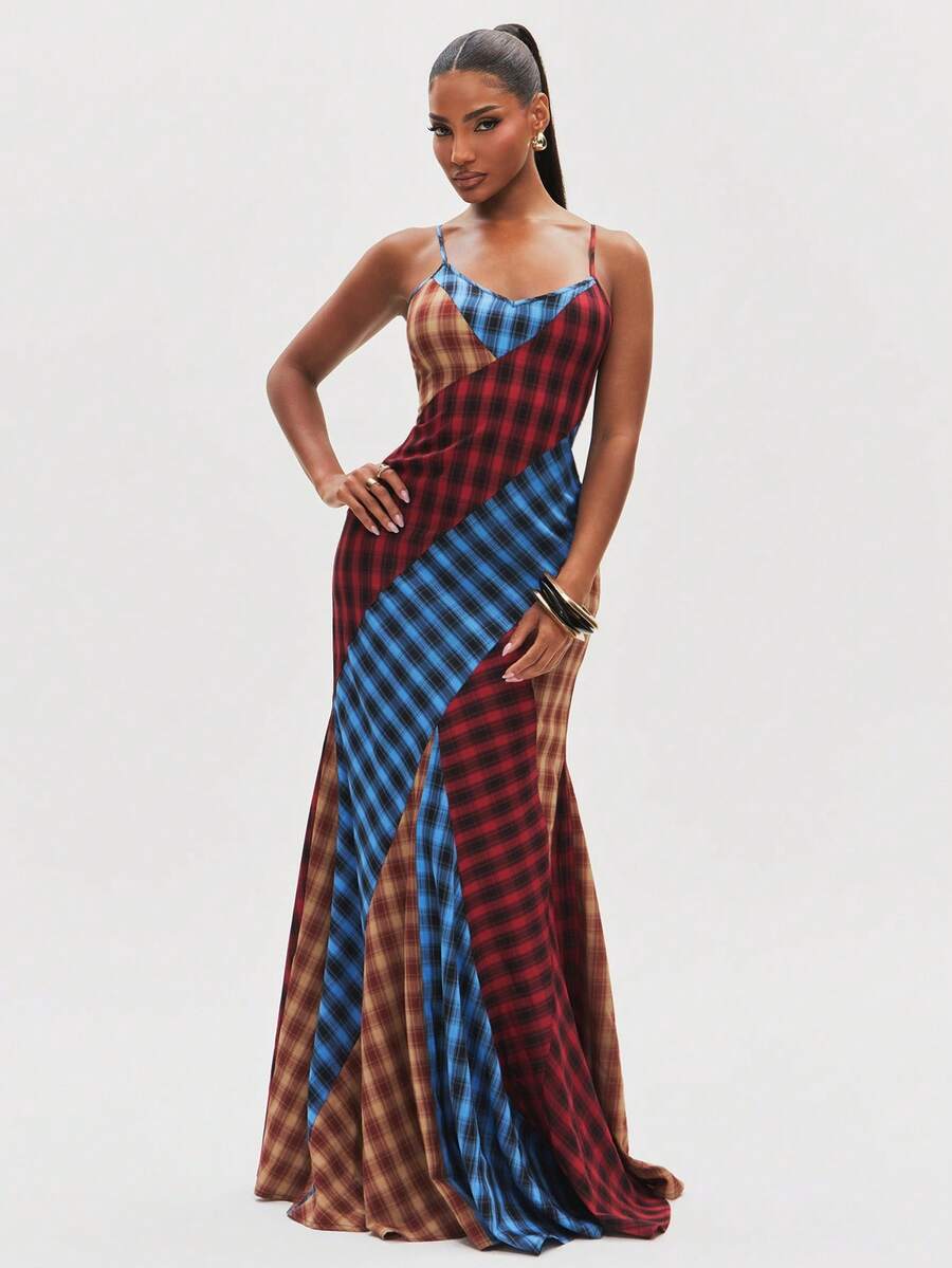 Front view of patchwork plaid maxi dress with cowl neckline, fitted silhouette and flared floor-length hem