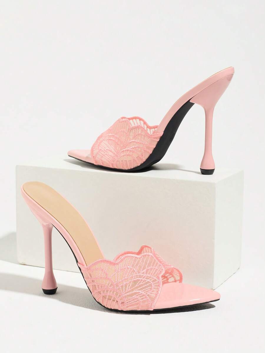 Pink leaf-lace pointed open-toe mule pair with flared stiletto heels