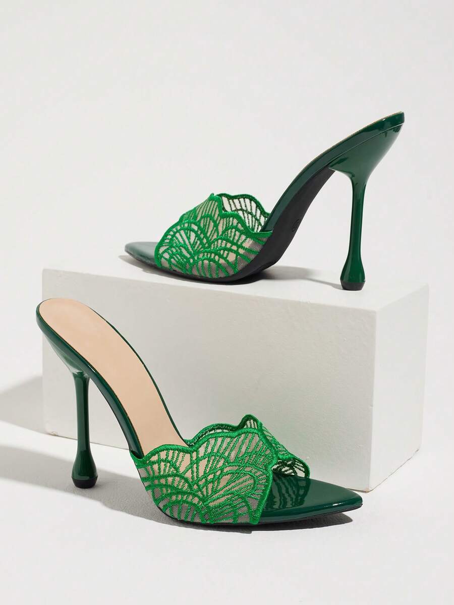 Green leaf-lace pointed open-toe mule pair with flared stiletto heels