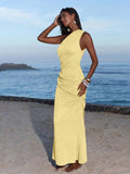 Full front view of light yellow one-shoulder ruched bodycon maxi dress for beach vacation styling