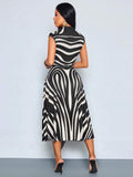 Back view of black and white zebra print belted midi dress with sleeveless A-line silhouette and back zipper