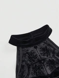 Close-up of black flocked floral mesh halter neckline and velvet collar