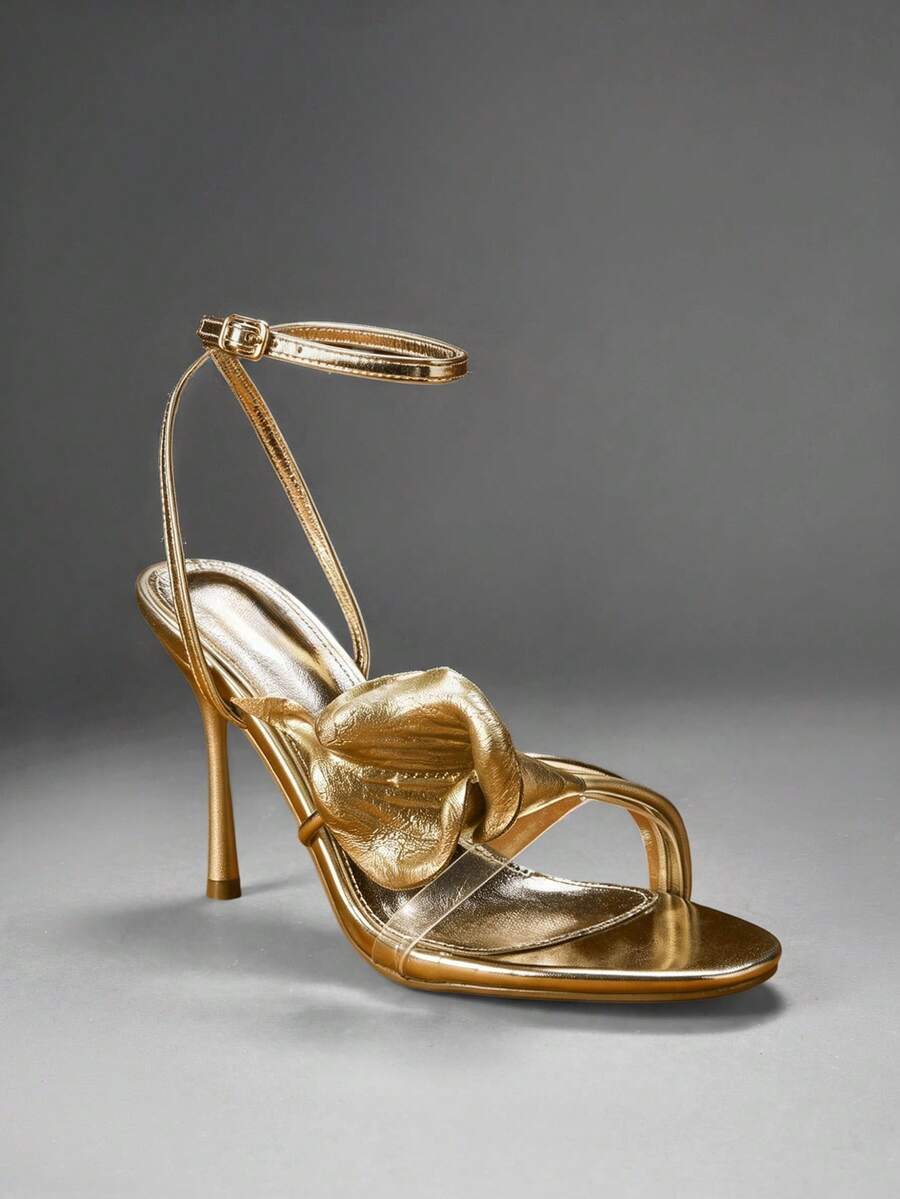 Elegant floral ankle strap stiletto heels for women. Glamorous sandals perfect for weddings, parties, date nights, dinners, and special occasions.
