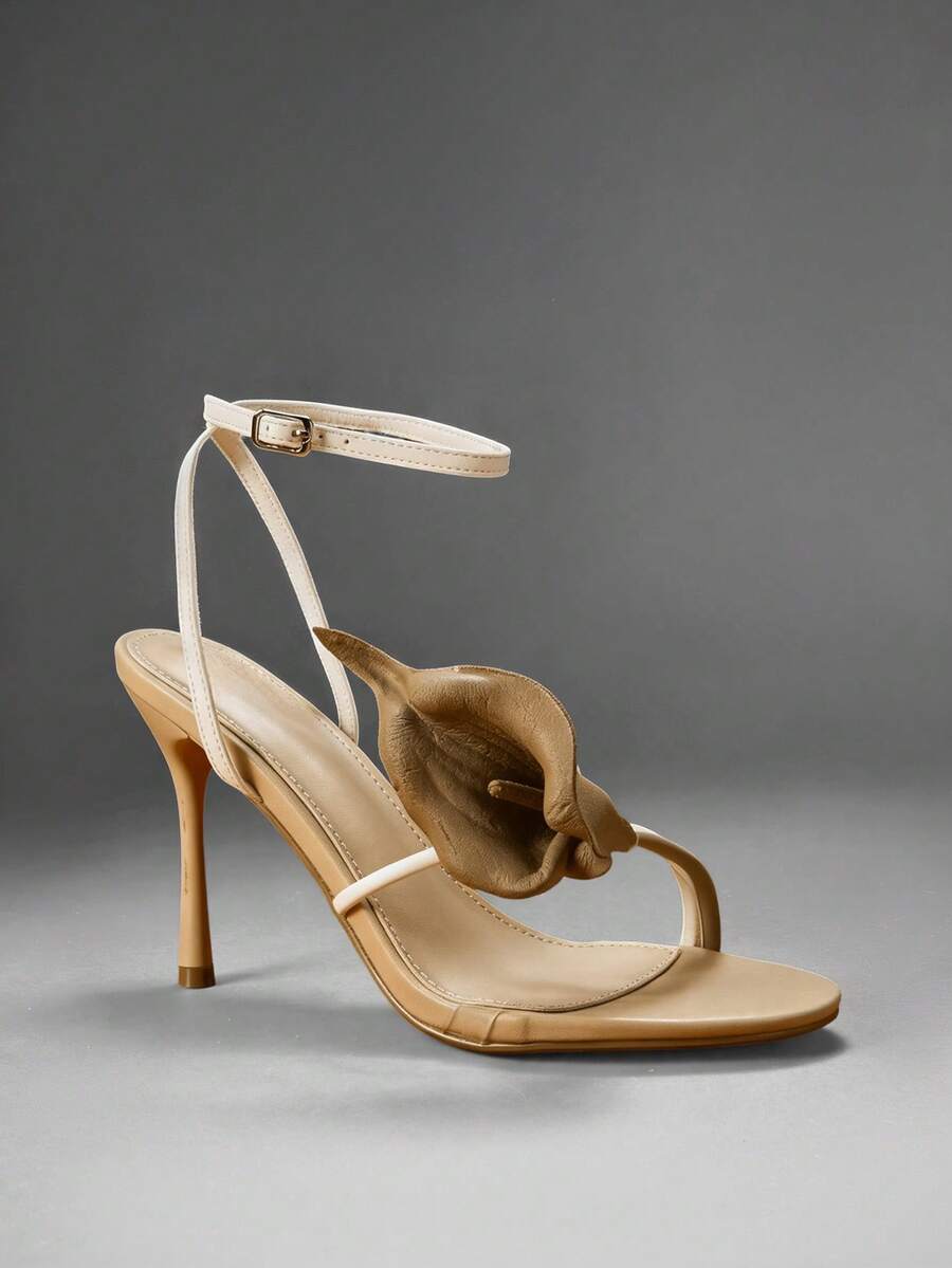 Elegant floral ankle strap stiletto heels for women. Glamorous sandals perfect for weddings, parties, date nights, dinners, and special occasions.

