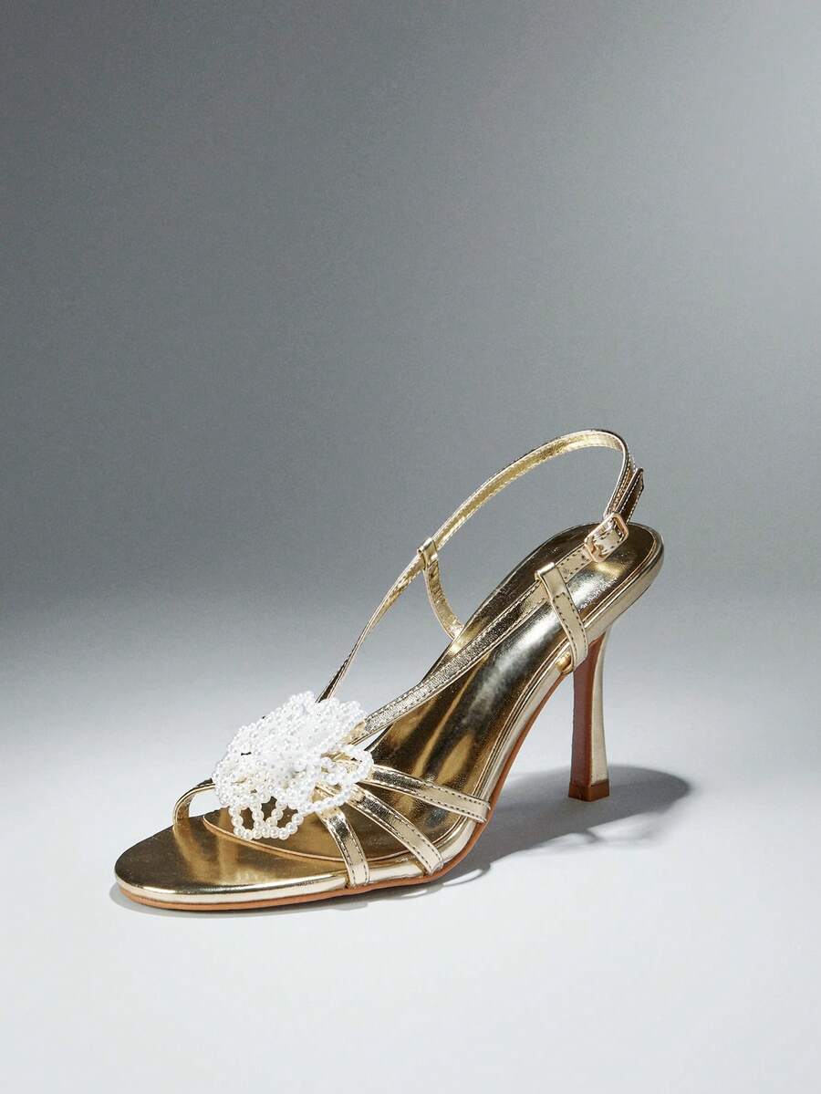 Make a sophisticated statement with these glamorous square toe stiletto sandals for women. Designed with a sleek slip on silhouette, elegant square toe, and slender stiletto heel, these sandals create a refined and feminine look that instantly elevates dressy outfits.