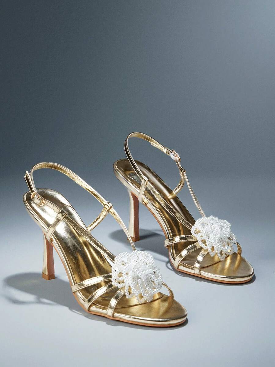 Make a sophisticated statement with these glamorous square toe stiletto sandals for women. Designed with a sleek slip on silhouette, elegant square toe, and slender stiletto heel, these sandals create a refined and feminine look that instantly elevates dressy outfits.
