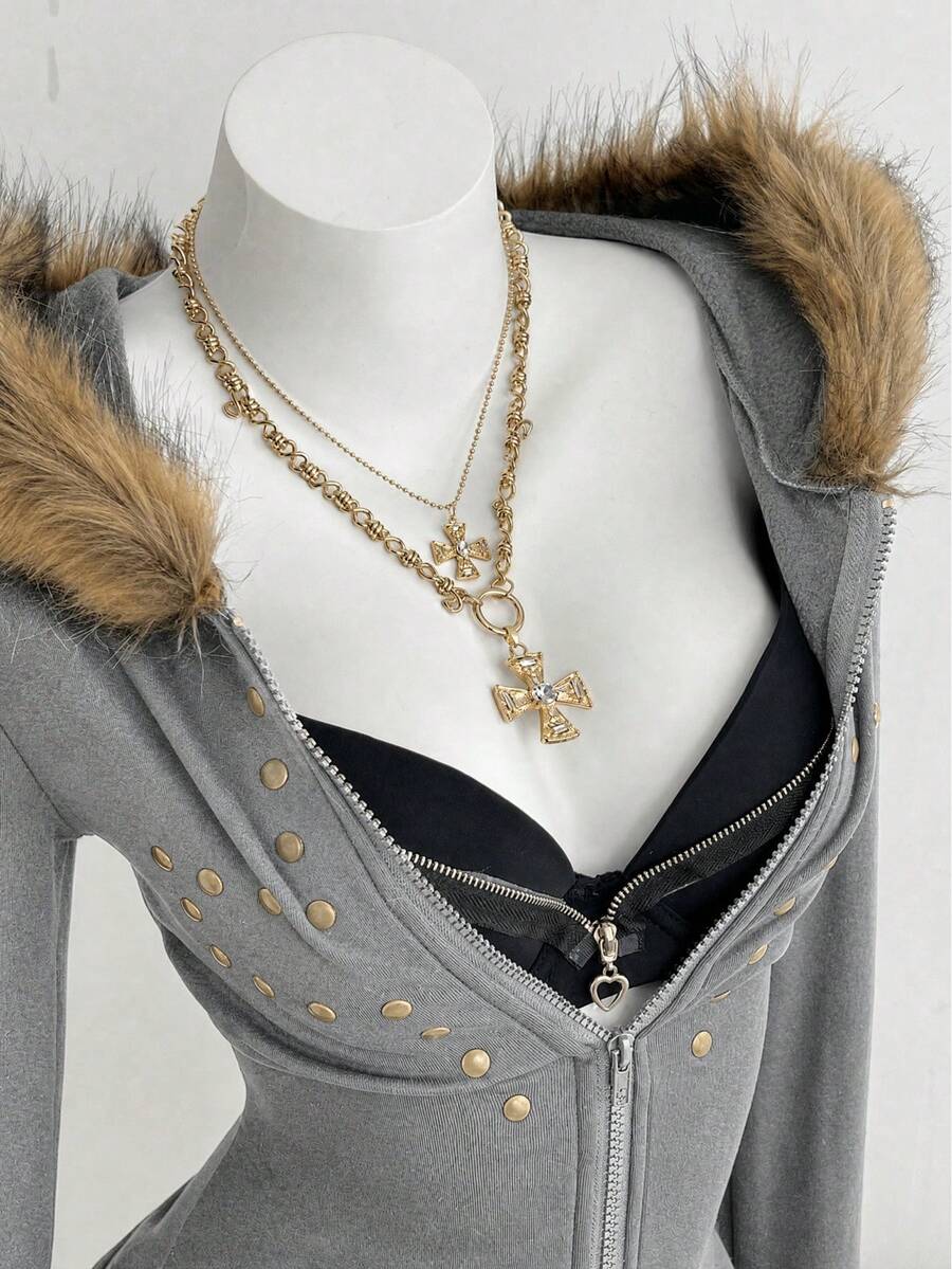 Front view of grey corset zip-up hoodie with faux-fur trim and gold studs