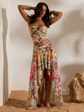 Front full view of tropical multicolor print ruched bandeau top and high-slit mesh maxi skirt two-piece set for beach vacation styling