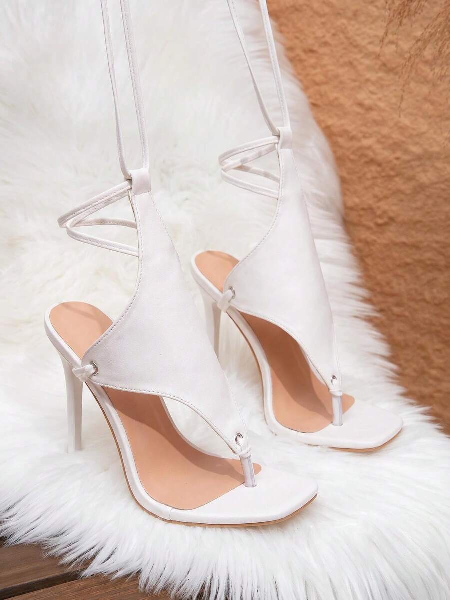 Product view of white lace up square toe stiletto sandals