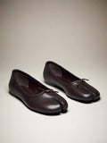 Pair of coffee brown split-toe ballet flats with bows