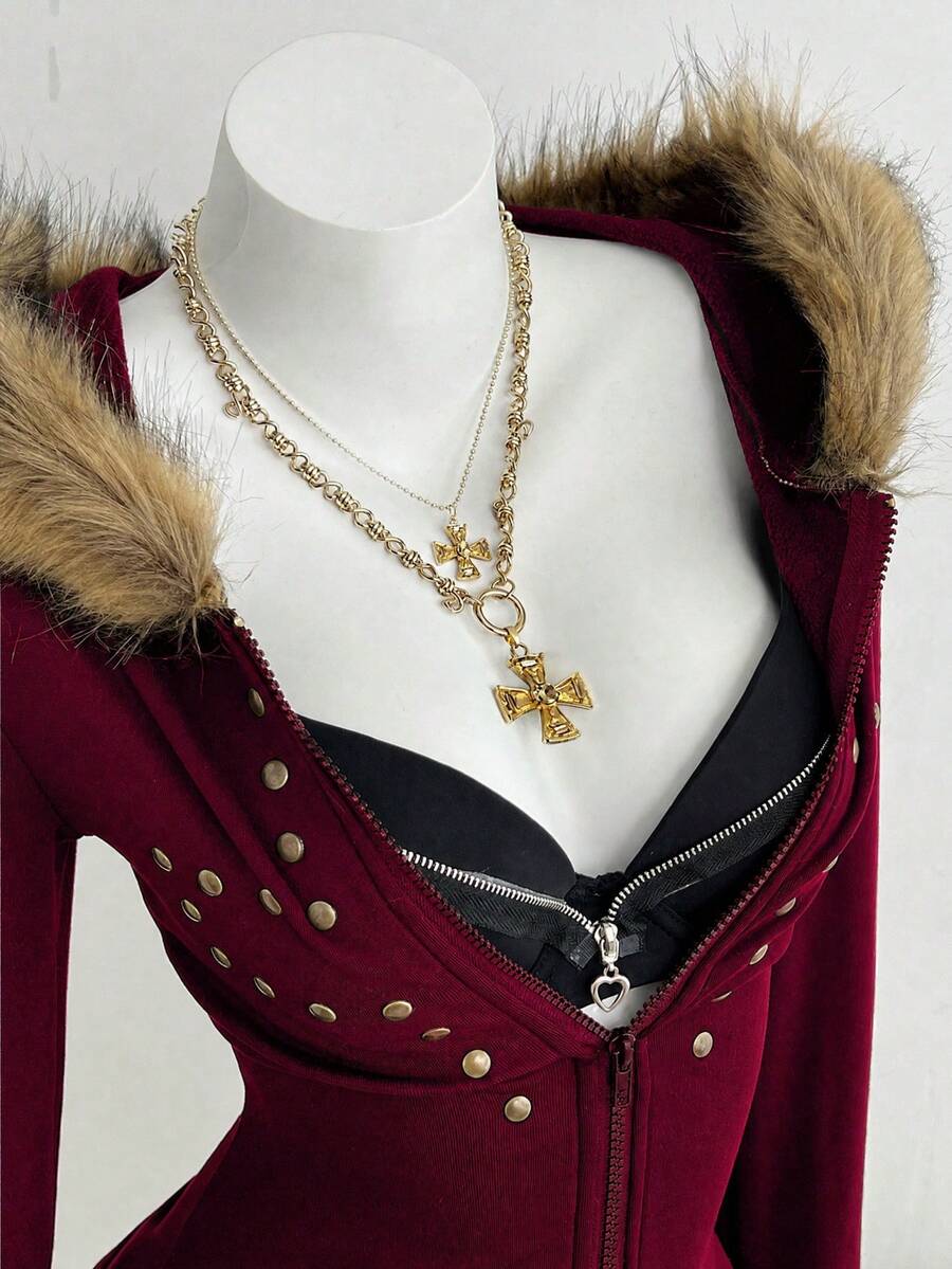 Front view of burgundy gothic hooded zip jacket with faux-fur trim and brass studs