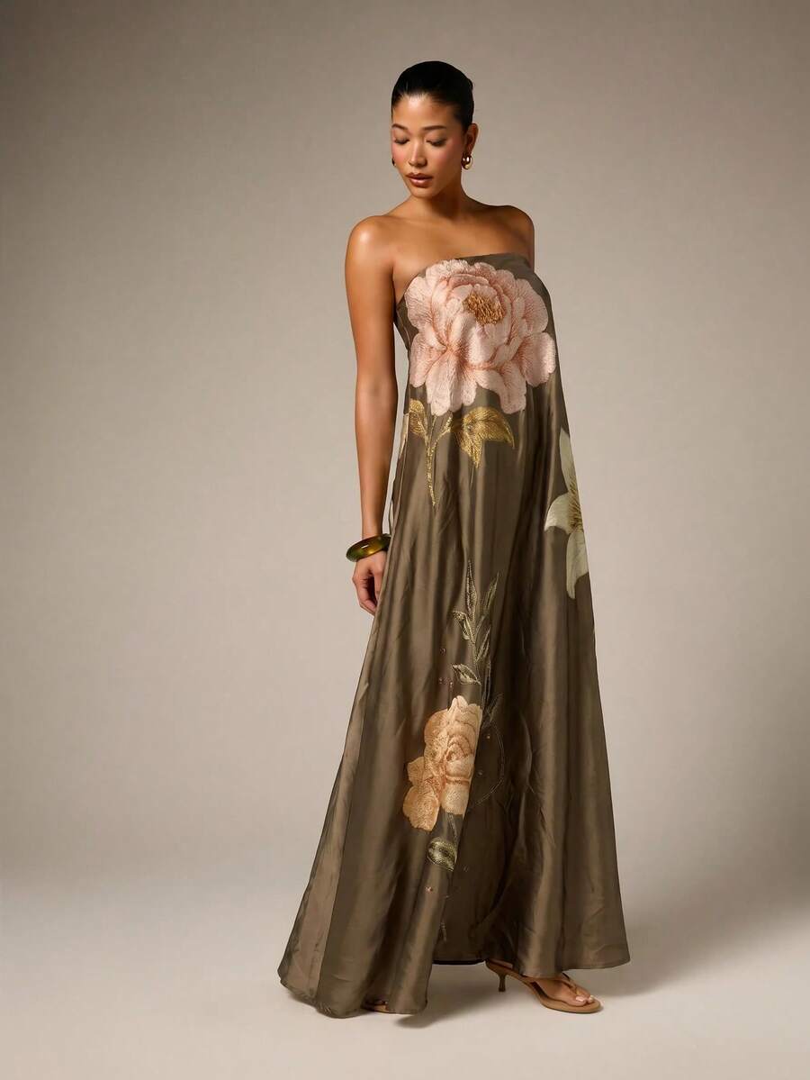Front view of army green strapless satin maxi dress with pale rose embroidery and flowing skirt