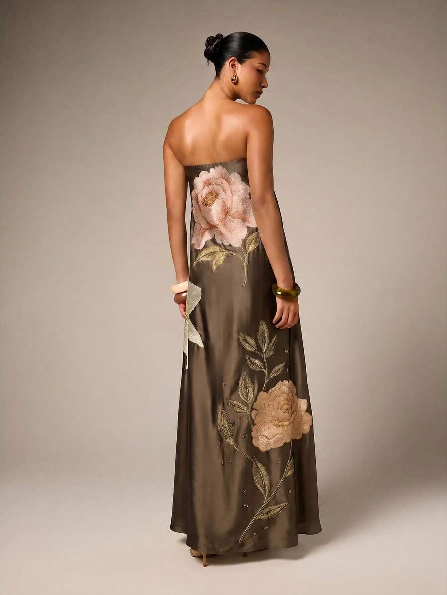 Back view of army green floral embroidered maxi gown with bare shoulders