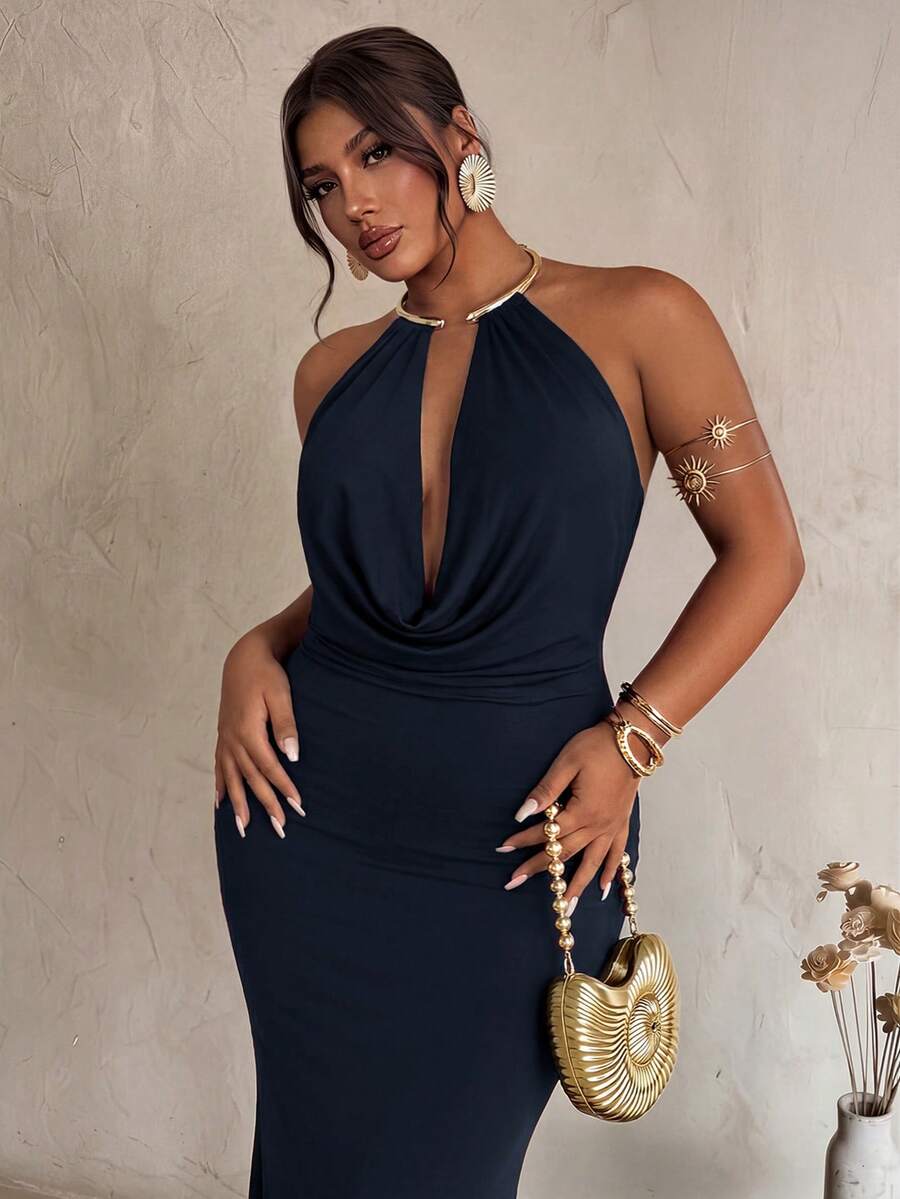 Close front view of navy evening dress with draped neckline and ruched waist