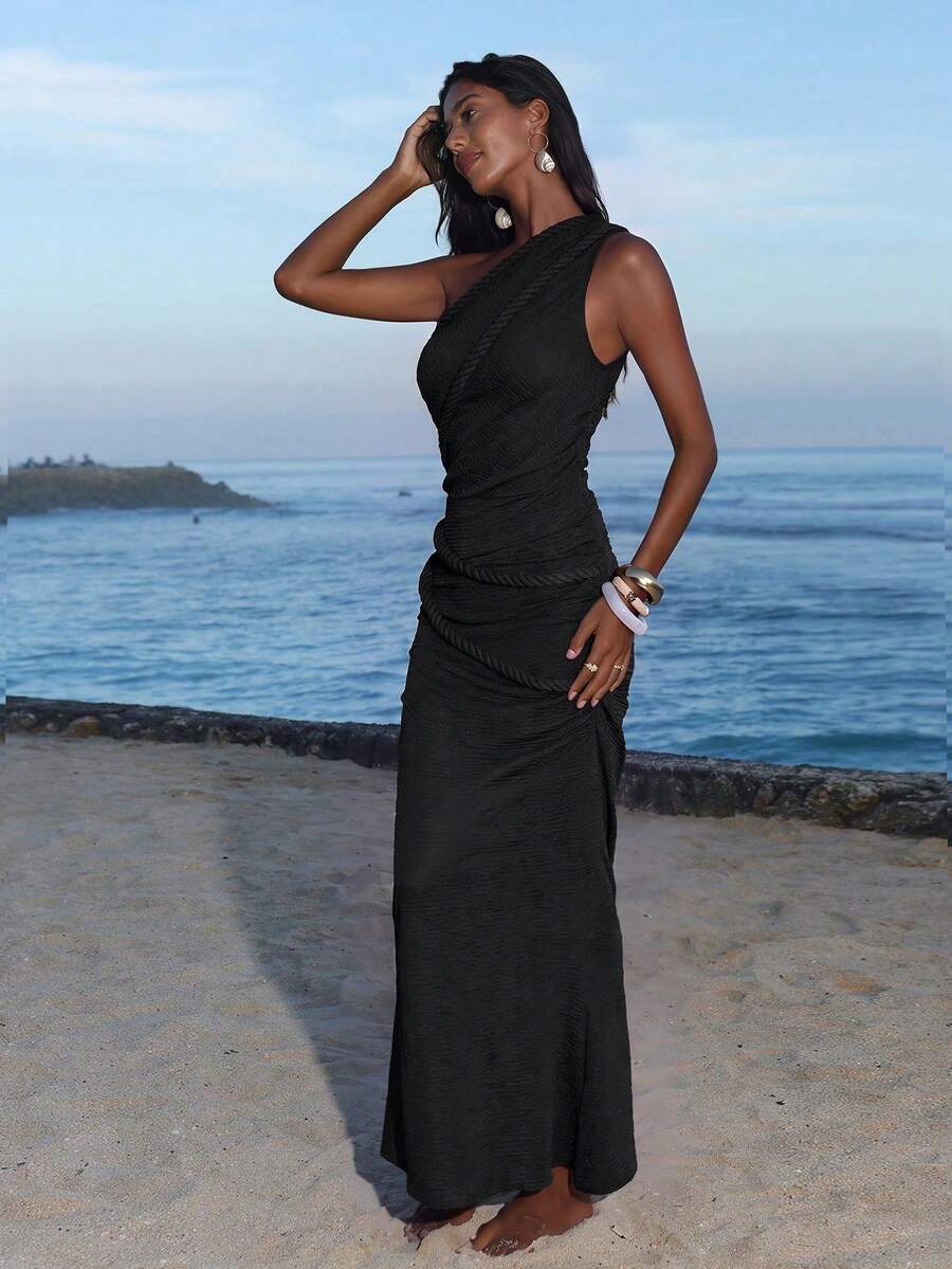Full front view of black one-shoulder ruched bodycon maxi dress for beach vacation styling