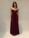 Turquoise pleated halter maxi dress with ruched bust, front view