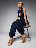 Khaki worn front view of pointed-toe buckle mule sandals with woven fabric upper, open toe, and high stiletto heel