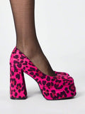 Side close-up of hot pink leopard print platform pump and chunky heel