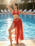 Front view of red five-piece belly dance costume with gold coin belt and slit skirt