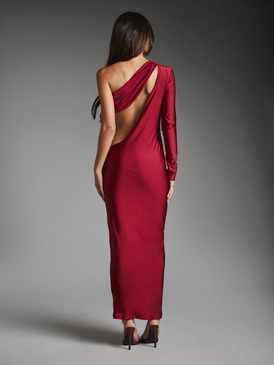 Full back view of burgundy fitted maxi dress showing its open back and asymmetric shoulder strap