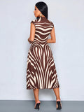 Back view of khaki and white zebra print belted midi dress with sleeveless A-line silhouette and back zipper