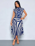 Close-up front view of navy blue and white zebra print belted midi dress with zebra print, buckle belt and long waist tie